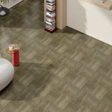 Wood-effect vinyl floor tile planks in dark gray with a woven herringbone pattern
