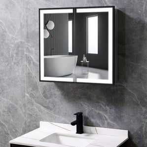 Wall-mounted LED mirror cabinet with open doors above a white bathroom vanity