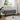 Grey upholstered bench with rounded seat and wooden legs