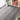 Grey oak herringbone PVC flooring with detailed woodgrain texture