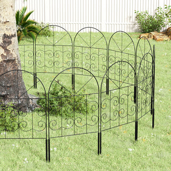 Black metal garden border fence set of arched panels with scrollwork and ground stakes