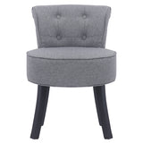 Grey upholstered vanity stool with round padded seat and tufted back, black wooden legs