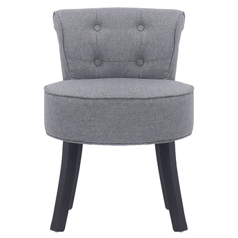 Grey upholstered vanity stool with round padded seat and tufted back, black wooden legs