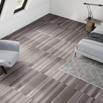Gray wood-grain self-adhesive vinyl plank flooring set in room corner view