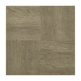 Wood-effect PVC floor tile sample in muted gray with visible grain and plank seams