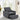 Dark grey sofa bed chair with tufted backrest and extended pull-out seat