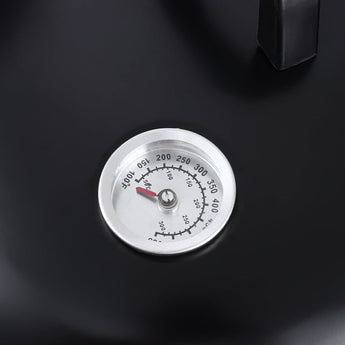 Close-up thermometer gauge on black charcoal grill smoker lid, 150–350°F range