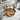 Round bronze countertop vessel sink basin with central drain opening