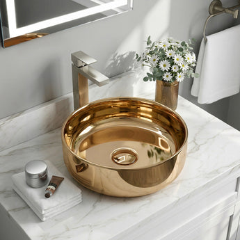 Round bronze countertop vessel sink basin with central drain opening