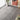 Light grey herringbone PVC floor tiles with self-adhesive layout in living space