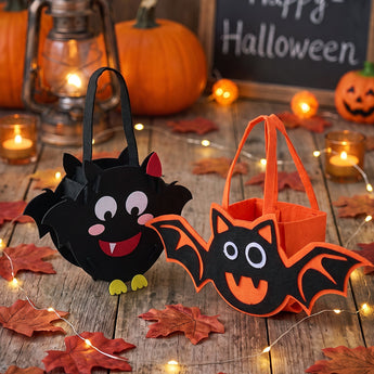 Pair of felt Halloween tote bags: black bat face and orange cat face with handles