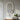 Wall-mounted oval LED bathroom mirror with slim profile and bright LED ring
