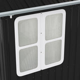 White window panel with four frosted panes on black metal shed wall