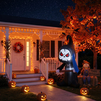 Inflatable witch skeleton decoration with hood, red eyes, black dress, blue arms, wand
