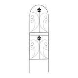 Black metal decorative fence panel with arched top, scrolls, and fleur-de-lis motif