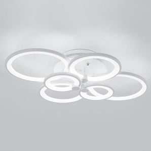 White circular LED semi-flush ceiling light with four outer rings and a central plate