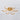 Golden acrylic LED semi-flush mount ceiling light with five circular ring shades
