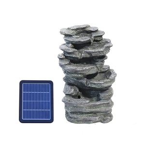 Cascading rock water fountain with solar panel, dark gray stone look