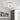 White circular LED semi-flush mount ceiling light with four glowing ring sections