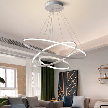 Tiered LED hanging ceiling light with three glowing white circular ring shades and cables