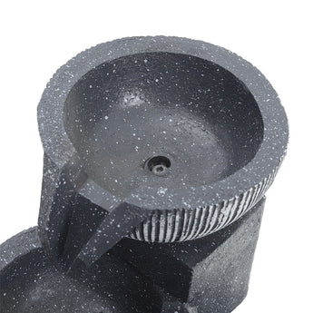 Top basin of 4-tier fountain, gray textured stone with drain opening