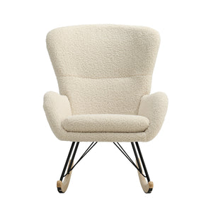 Beige faux wool rocking chair with rounded backrest and padded armrests, black metal legs
