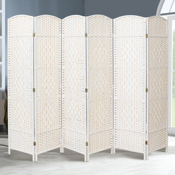 White woven rattan foldable room divider with multiple panels, rounded tops, and legs