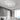 White circular LED semi-flush ceiling light with multiple illuminated ring panels
