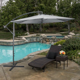 Light grey 3m cantilever parasol umbrella over outdoor seating area