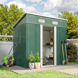 Green metal garden tool storage shed with sloped roof, open side door