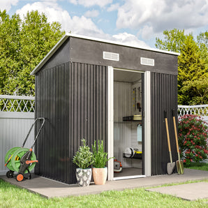 Black metal garden tool storage shed with sloped roof, open side door