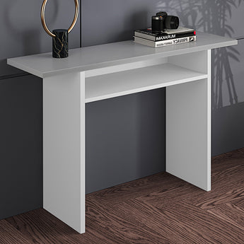 White makeup table with open lower shelf and tabletop for decor and accessories.