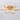 Gold acrylic LED semi-flush mount ceiling light with five oval white light rings and gold base